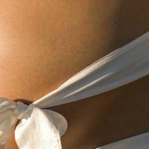 Как да носите превръзка за бременни жени